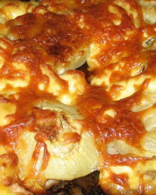 Свинина по-французски с сыром и луком