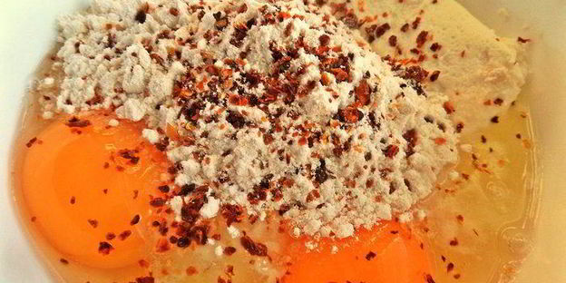 творожные ньокки со шпинатом, запеченные под сыром