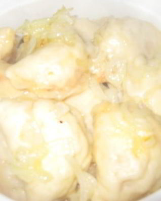 Вареники с тушеной капустой в томате