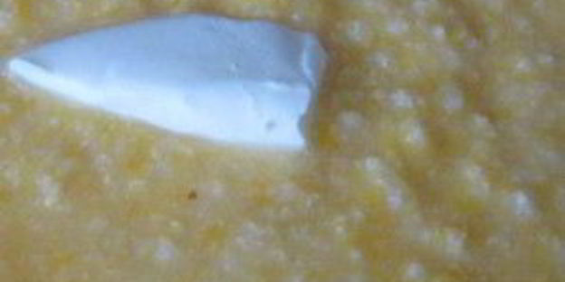 пшенная каша в чугунке